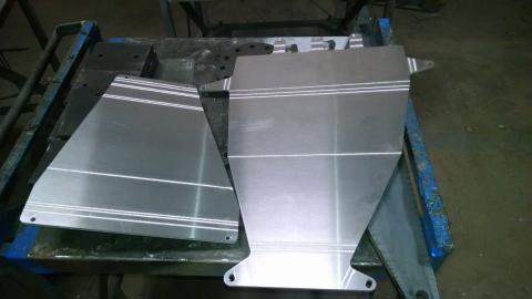 Four wheeler aluminum skid plates.